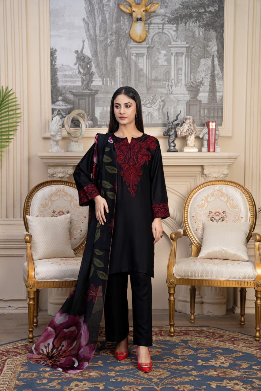 Elegant black Pakistani 3 piece suit with intricate red embroidery | Janan Collections
