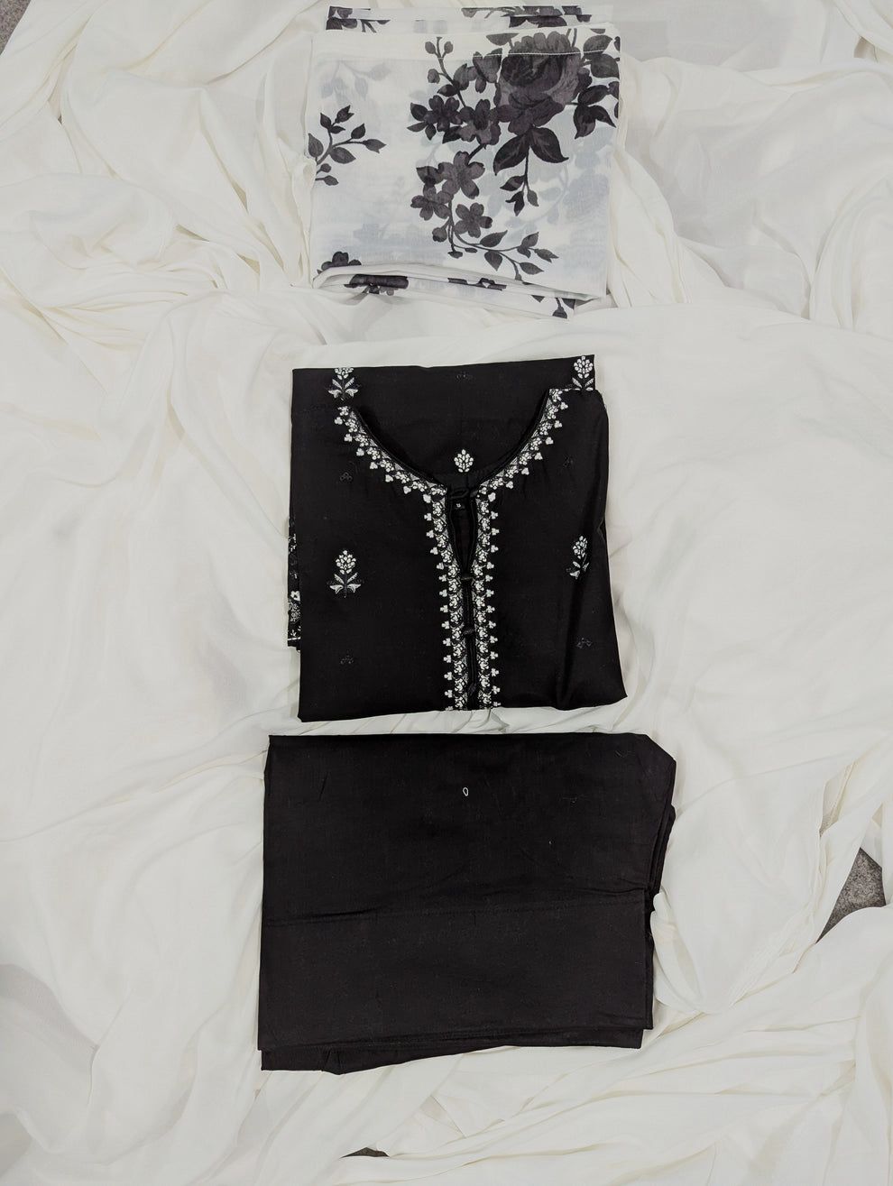 Elegant black Pakistani embroidered suit for women