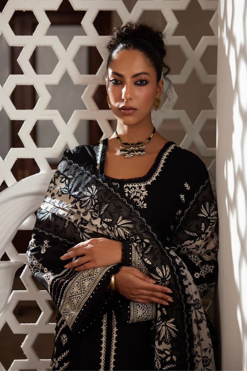 Traditional black embroidered Pakistani outfit for women